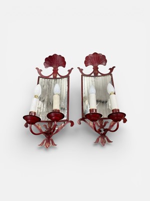 Lot 5051 - Pair of red toleware two branch wall sconces with mirrored backs, 57cm high