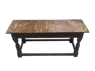 Lot 5303 - Early 20th century carved oak long stool / window seat, measuring approximately 97cm.
