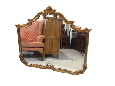 Lot 5320 - Large gilt mirror with scroll work design measuring approximately 104cm