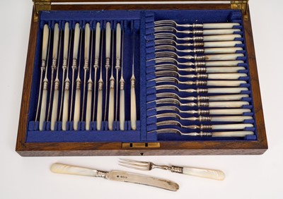 Lot 259 - Set of silver and mother of pearl fruit / dessert cutlery in original fitted oak case.