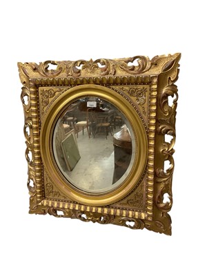 Lot 1321 - 19th century carved giltwood wall mirror.