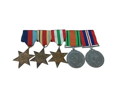 Lot 2 - Second World War medal group comprising 1939 - 1945 Star, Africa Star, Italy Star, Defence and War medals (mounted on bar).