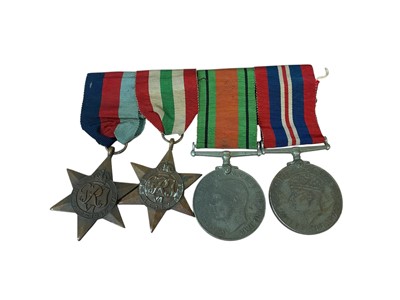 Lot 4 - Second World War medal group comprising 1939 - 1945 Star, Italy Star, Defence and War medals (mounted on bar).
