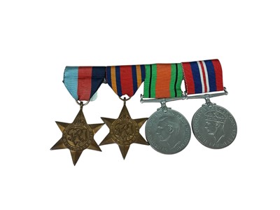 Lot 6 - Second World War medal group comprising 1939 - 1945 Star, Burma Star, Defence and War medals (mounted on bar).