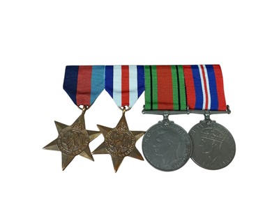 Lot 7 - Second World War medal group comprising 1939 - 1945 Star, France and Germany Star, Defence and War medals (mounted on bar).