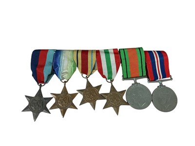 Lot 8 - Second World War medal group comprising 1939 - 1945 Star, Atlantic Star, Africa Star, Italy Star, Defence and War medals (mounted on bar).
