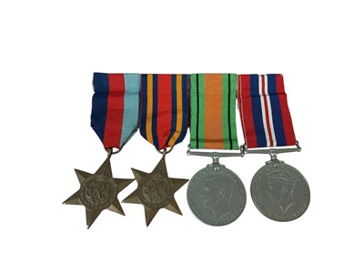 Lot 9 - Second World War medal group comprising 1939 - 1945 Star, Burma Star, Defence and War medals (mounted on bar).
