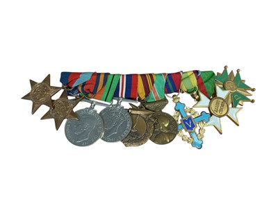 Lot 17 - Second World War medal group comprising 1939 - 1945 Star, Burma Star Defence and War medals, together with five another European medals / decorations (mounted on bar).