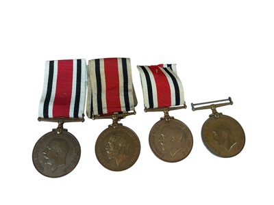 Lot 25 - Collection of four George V Special Constabulary Long Service medals named to George J. Rase, Henry Philo, John Procter and Clement Johnstone - Smith, (4).