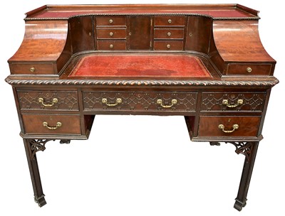 Lot 1379 - Fine quality 1920s mahogany Carlton House desk, of rounded form with...