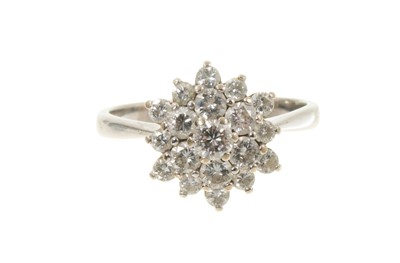 Lot 432 - 1970s diamond cluster ring in 18ct white gold setting