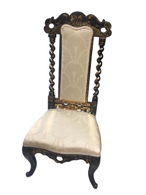 Lot 5329 - Victorian paper mache nursing chair with gilt and mother of pearl inlaid decoration, together with a papier mache side table with shaped top (2)