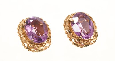 Lot 473 - Pair of amethyst ear clips in 14ct rose gold setting