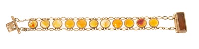 Lot 474 - 19th century carnelian bracelet in yellow metal mounts
