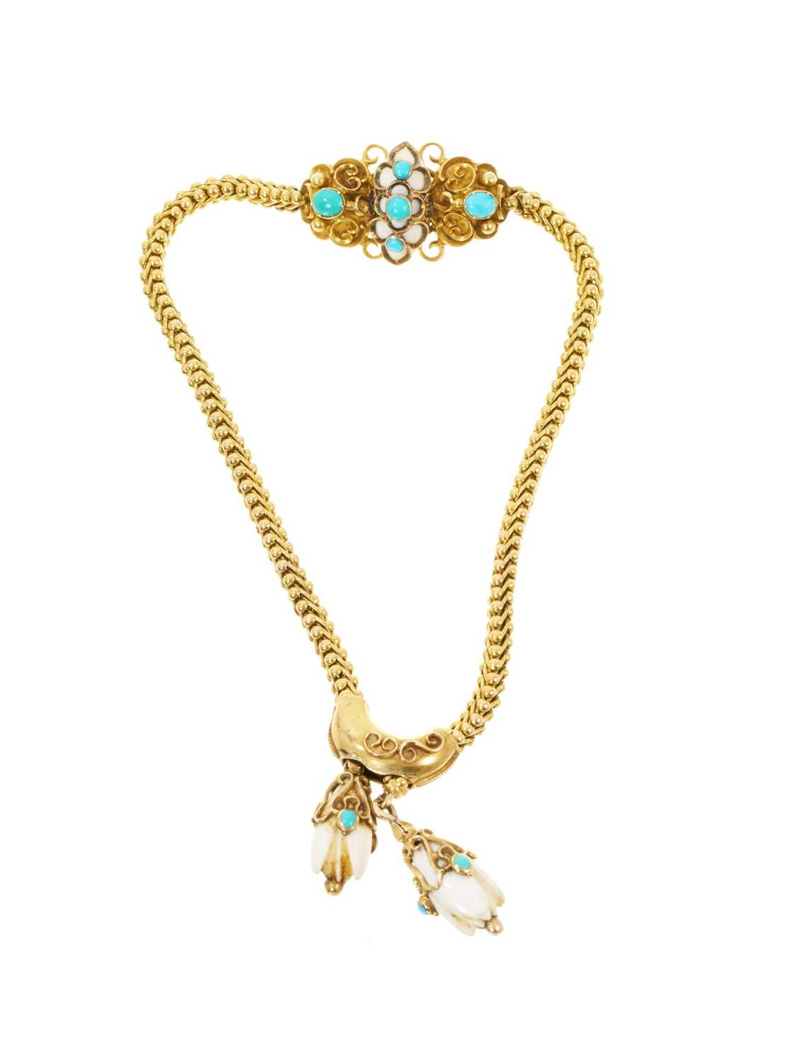 Lot 475 - Victorian yellow metal bracelet with snake links, turquoise cabochons and carved ivory terminals