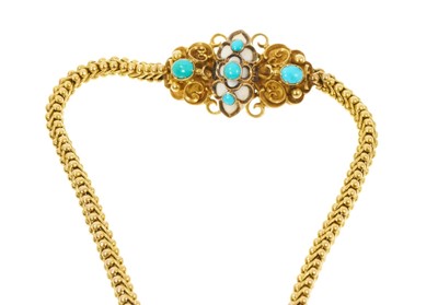 Lot 475 - Victorian yellow metal bracelet with snake links, turquoise cabochons and carved ivory terminals