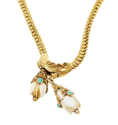 Lot 475 - Victorian yellow metal bracelet with snake links, turquoise cabochons and carved ivory terminals