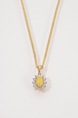 Lot 557 - Diamond and opal pendant necklace