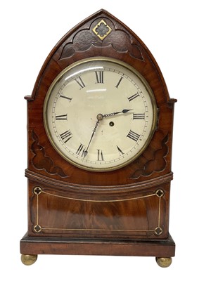 Lot 655 - Late Regency bracket clock with white painted dial, single fusée movement striking on bell in lancet-shaped Gothic influence brass inlaid mahogany case, raised on ball feet 50cm high, key and p...