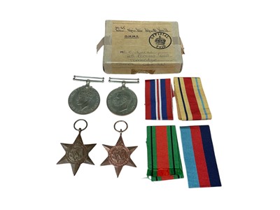 Lot 40 - Second World War medal group comprising 1939 - 1945 Star, Africa Star, Defence and War medals, in box of issue named to Mr C. Lucas, 25 Princess Court, Cambridge.