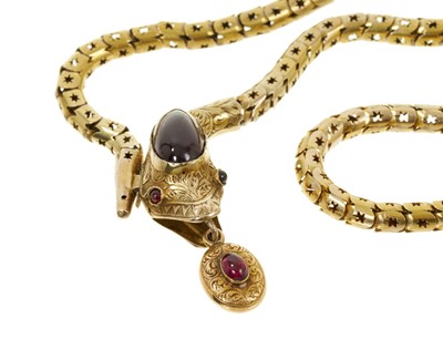 Lot 401 - Victorian gold cabochon garnet snake necklace