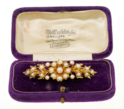 Lot 402 - Victorian gold and seed pearl floral brooch