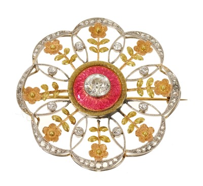 Lot 405 - Diamond and enamel set open work flower head pendant / brooch