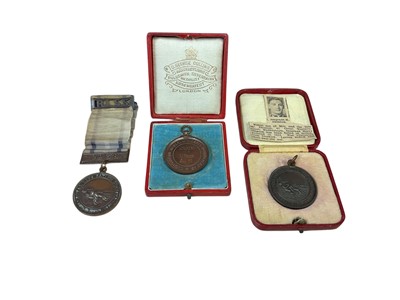 Lot 49 - Royal Life Saving Society medal named to J. V. Waters, a similar medallion named to A. Prior, in fitted case and another medallion named to E. Shinton, (3). N.B. with newspaper clipping S...