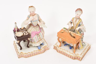 Lot 150 - 19th century Vienna porcelain figure of a woman seated by her dressing table, and another similar figure of a woman playing a piano
