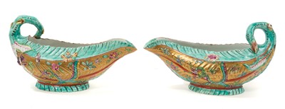 Lot 127 - Unusual pair of Worcester cos lettuce form sauceboats, with clobbered decoration