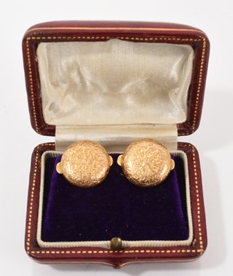 Lot 418 - Pair of Victorian 15ct gold dress studs / buttons with engraved floral scroll decoration