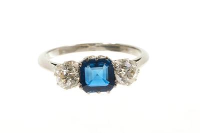 Lot 423 - Sapphire and diamond three stone ring in white gold setting