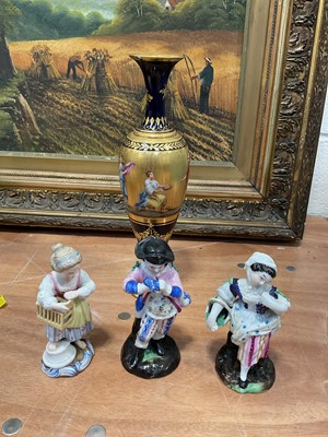 Lot 5167 - Vienna style porcelain vase painted with classical figures, signed Fischer, together with a Dresden figure of a girl with a bird cage and two other figures (4)