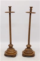 Lot 1347 - Pair of antique elm ecclesiastical candle...