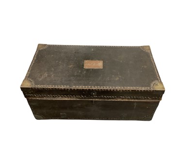 Lot 1432 - 19th century British Officer's leather covered campaign trunk with brass studded and bound decoration, brass plaque to lid engraved 'Colonel Newall C.B.', .