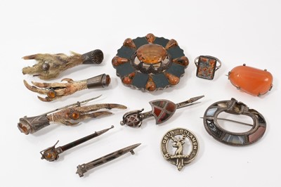 Lot 456 - Scottish silver cairngorm and hardstone large oval brooch, carnelian pebble brooch and other similar Scottish jewellery