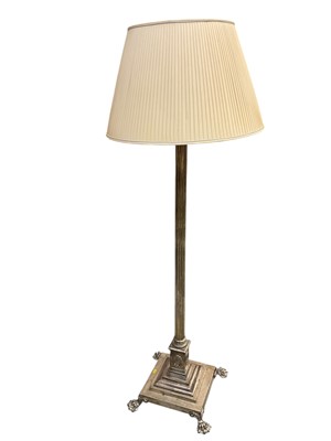 Lot 1372 - Silver plated Corinthian column standard lamp, on stepped base and spread paw feet 169cm high