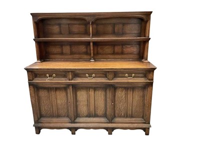 Lot 1391 - Arts and Crafts two height oak sideboard attributed to Morris & Co. after a design by Philip Webb, with arcaded boarded rack and enclosed to the base by two frieze drawers and panelled cupbo...