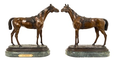 Lot 933 - After Jules Moigniez (French 1835-1894) pair of bronze saddled racehorses, each bearing signatures, on oval marble bases, 34.5cm high