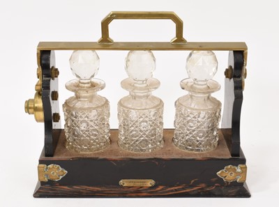 Lot 869 - Small Victorian coromandel tantalus "THE TANTALUS" BETJEMINS PATENT