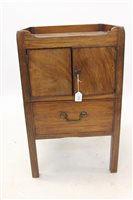 Lot 1366 - George III mahogany bedside cupboard with...