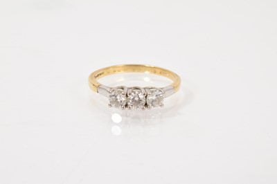 Lot 543 - Diamond three-stone ring with three round brilliant cut diamonds estimated to weigh approximately 0.54cts in total, in claw setting on 18ct gold shank.