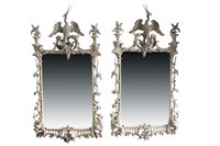 Lot 1371 - Pair of Chippendale-style cream painted ornate...