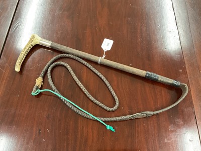 Lot 906 - Early 20th century silver mounted hunting whip with stag horn handle and leather shaft