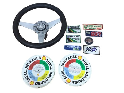Lot 45 - Group of assorted automobilia to include a Moto-lita steering wheel, various key rings, badges and cloth badges (1 box).