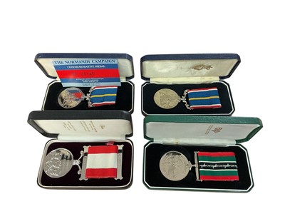 Lot 138 - Two unofficial National Service Medals, together with a P.O.W. medal and a Canadian medal, all in boxes of issue, (4).