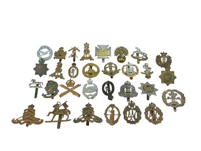 Lot 164 - Collection of approximately thirty British Military cap badges to include Royal Artillery and Machine Gun Corps, (30).