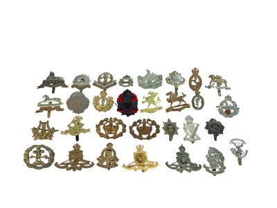 Lot 165 - Collection of approximately thirty British Military cap badges to include Artists Rifles and Army Ordnance Corps, (30).