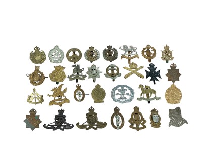 Lot 167 - Collection of approximately thirty British Military cap badges to include Royal Engineers and Royal Artillery, (30).