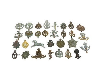Lot 169 - Collection of approximately thirty British Military cap badges to include ATS and Duke of Cornwall's Light Infantry, (30).